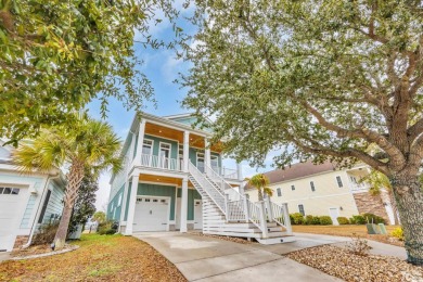 This stunning Charleston-style home offers timeless elegance and on Myrtlewood Golf Course and Club  in South Carolina - for sale on GolfHomes.com, golf home, golf lot