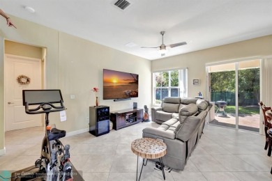 STUNNING 4-BEDROOM 3-BATHROOM POOL HOME IN THE HEART OF CORAL on Country Club of Coral Springs in Florida - for sale on GolfHomes.com, golf home, golf lot