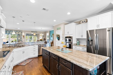 Experience refined coastal living in this beautifully appointed on Crow Creek Golf Club in North Carolina - for sale on GolfHomes.com, golf home, golf lot