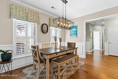 Experience refined coastal living in this beautifully appointed on Crow Creek Golf Club in North Carolina - for sale on GolfHomes.com, golf home, golf lot