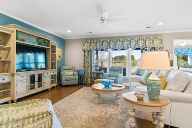 Experience refined coastal living in this beautifully appointed on Crow Creek Golf Club in North Carolina - for sale on GolfHomes.com, golf home, golf lot