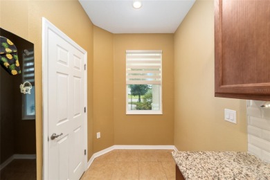 Move-in ready Elon model located in the desirable Weybourne on Candler Hills Golf and Country Club in Florida - for sale on GolfHomes.com, golf home, golf lot