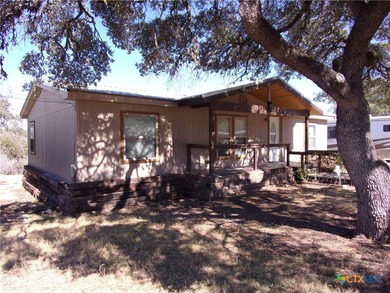 Updated 3/2 double wide mfg. home with hill country views! Home on Rebecca Creek Golf Club in Texas - for sale on GolfHomes.com, golf home, golf lot