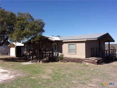 Updated 3/2 double wide mfg. home with hill country views! Home on Rebecca Creek Golf Club in Texas - for sale on GolfHomes.com, golf home, golf lot