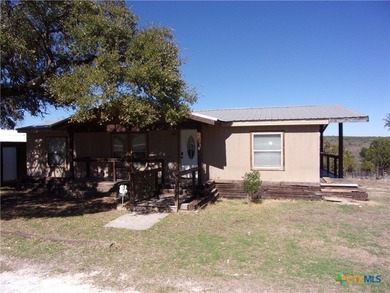 Updated 3/2 double wide mfg. home with hill country views! Home on Rebecca Creek Golf Club in Texas - for sale on GolfHomes.com, golf home, golf lot