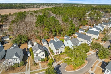 Welcome to this stunning home, nestled on a private wooded lot on Charleston National Golf Club in South Carolina - for sale on GolfHomes.com, golf home, golf lot