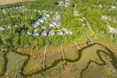 Welcome to this stunning home, nestled on a private wooded lot on Charleston National Golf Club in South Carolina - for sale on GolfHomes.com, golf home, golf lot