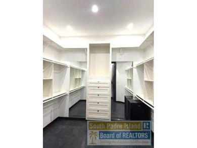 Luxury living in paradise! Located on prestigious Laguna Madre on South Padre Island Golf Club in Texas - for sale on GolfHomes.com, golf home, golf lot