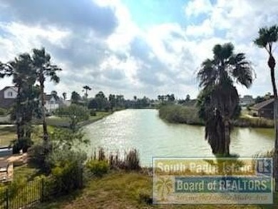 Luxury living in paradise! Located on prestigious Laguna Madre on South Padre Island Golf Club in Texas - for sale on GolfHomes.com, golf home, golf lot