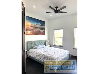 Luxury living in paradise! Located on prestigious Laguna Madre on South Padre Island Golf Club in Texas - for sale on GolfHomes.com, golf home, golf lot