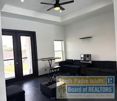 Luxury living in paradise! Located on prestigious Laguna Madre on South Padre Island Golf Club in Texas - for sale on GolfHomes.com, golf home, golf lot