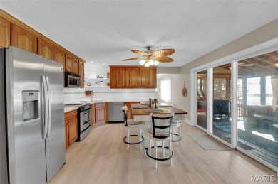 Get ready to Jump into Lake Life! This updated lakefront home on on Lake Saint Louis Par 3 in Missouri - for sale on GolfHomes.com, golf home, golf lot