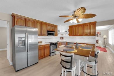 Get ready to Jump into Lake Life! This updated lakefront home on on Lake Saint Louis Par 3 in Missouri - for sale on GolfHomes.com, golf home, golf lot