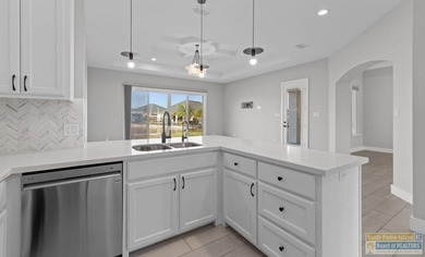 Perfectly located four bedroom, 3 bath custom home located in on South Padre Island Golf Club in Texas - for sale on GolfHomes.com, golf home, golf lot