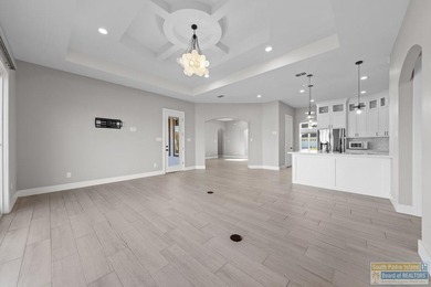 Perfectly located four bedroom, 3 bath custom home located in on South Padre Island Golf Club in Texas - for sale on GolfHomes.com, golf home, golf lot