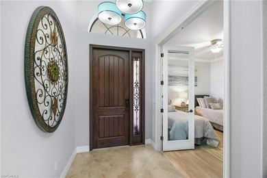 GOLF MEMBERSHIP INCLUDED! Escape to a serene, sun-kissed home on Bonita National Golf Course in Florida - for sale on GolfHomes.com, golf home, golf lot