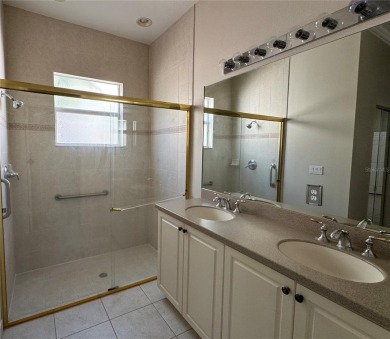 THIS HOME IS A GREAT BUY & READY FOR YOU IN THE GATED PREMIER on Caloosa Greens Executive Golf Course in Florida - for sale on GolfHomes.com, golf home, golf lot