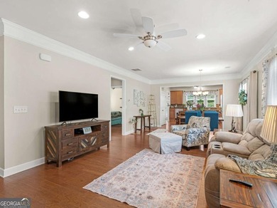 Welcome to this charming single-family home located in the on Canongate Golf At Sun City Peachtree in Georgia - for sale on GolfHomes.com, golf home, golf lot