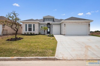 Discover luxury living with this stunning 3 bedroom, 3 bath, 1 on South Padre Island Golf Club in Texas - for sale on GolfHomes.com, golf home, golf lot