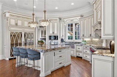 Perfectly positioned to capture sweeping views of the lake and on Manor Golf and Country Club in Georgia - for sale on GolfHomes.com, golf home, golf lot