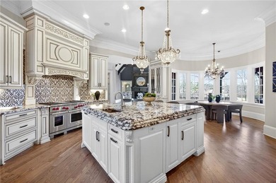 Perfectly positioned to capture sweeping views of the lake and on Manor Golf and Country Club in Georgia - for sale on GolfHomes.com, golf home, golf lot