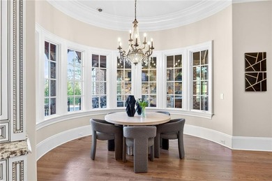 Perfectly positioned to capture sweeping views of the lake and on Manor Golf and Country Club in Georgia - for sale on GolfHomes.com, golf home, golf lot