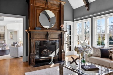 Perfectly positioned to capture sweeping views of the lake and on Manor Golf and Country Club in Georgia - for sale on GolfHomes.com, golf home, golf lot