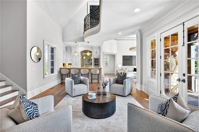 Perfectly positioned to capture sweeping views of the lake and on Manor Golf and Country Club in Georgia - for sale on GolfHomes.com, golf home, golf lot