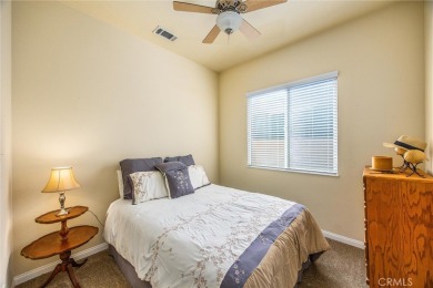 Welcome to this beautifully designed 2-bedroom, 2-bathroom home on Ashwood Golf Course in California - for sale on GolfHomes.com, golf home, golf lot