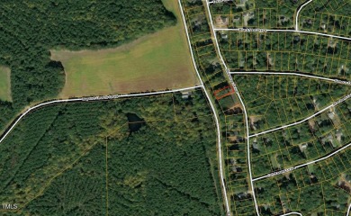 Attention Builders  Investors - Prime Gated-Lot Opportunity in on River Golf and County Club at Lake Royale in North Carolina - for sale on GolfHomes.com, golf home, golf lot
