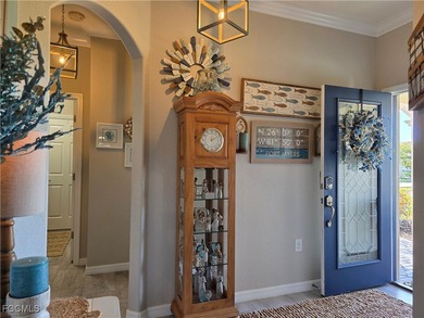 Welcome to a villa that understands the assignment; effortless on Pelican Preserve Golf Club in Florida - for sale on GolfHomes.com, golf home, golf lot