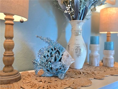 Welcome to a villa that understands the assignment; effortless on Pelican Preserve Golf Club in Florida - for sale on GolfHomes.com, golf home, golf lot