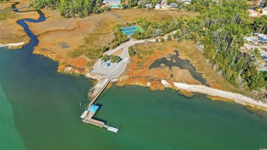 Welcome to Windjammer Village, a gated community in Little River on Glen Dornoch Waterway Golf Links in South Carolina - for sale on GolfHomes.com, golf home, golf lot