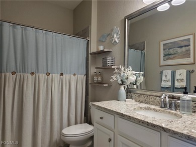 Welcome to a villa that understands the assignment; effortless on Pelican Preserve Golf Club in Florida - for sale on GolfHomes.com, golf home, golf lot