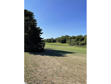 Twp. home? Here's a great opportunity to build your up north on A-Ga-Ming Golf Resort in Michigan - for sale on GolfHomes.com, golf home, golf lot