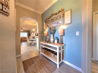 Welcome to a villa that understands the assignment; effortless on Pelican Preserve Golf Club in Florida - for sale on GolfHomes.com, golf home, golf lot