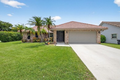 Open floor plan overlooking pool and golf course.  Besides the on Boca Greens Country Club in Florida - for sale on GolfHomes.com, golf home, golf lot