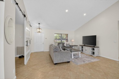 Open floor plan overlooking pool and golf course.  Besides the on Boca Greens Country Club in Florida - for sale on GolfHomes.com, golf home, golf lot