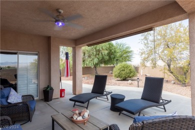 This well maintained, fully furnished home offers two spacious on Mojave Resort Golf Club in Nevada - for sale on GolfHomes.com, golf home, golf lot