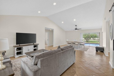 Open floor plan overlooking pool and golf course.  Besides the on Boca Greens Country Club in Florida - for sale on GolfHomes.com, golf home, golf lot