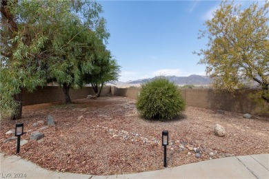 This well maintained, fully furnished home offers two spacious on Mojave Resort Golf Club in Nevada - for sale on GolfHomes.com, golf home, golf lot