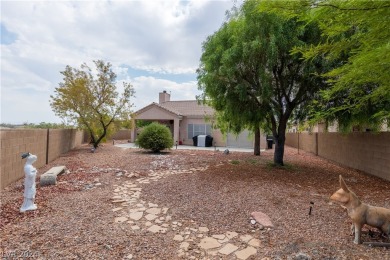 This well maintained, fully furnished home offers two spacious on Mojave Resort Golf Club in Nevada - for sale on GolfHomes.com, golf home, golf lot