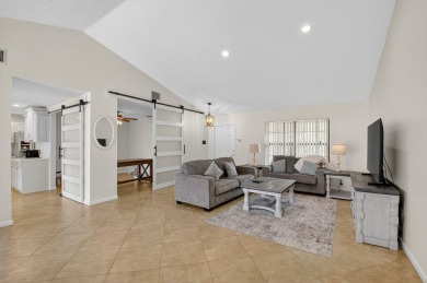 Open floor plan overlooking pool and golf course.  Besides the on Boca Greens Country Club in Florida - for sale on GolfHomes.com, golf home, golf lot