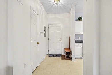 Welcome to this two-bedroom, two-bathroom first-floor condo in on Barefoot Resort and Golf Club  in South Carolina - for sale on GolfHomes.com, golf home, golf lot