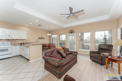 Well-maintained waterfront villa offering furnished, turn-key on South Padre Island Golf Club in Texas - for sale on GolfHomes.com, golf home, golf lot