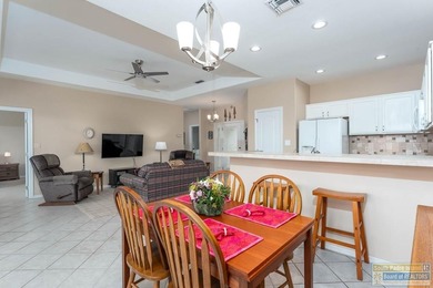 Well-maintained waterfront villa offering furnished, turn-key on South Padre Island Golf Club in Texas - for sale on GolfHomes.com, golf home, golf lot