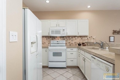 Well-maintained waterfront villa offering furnished, turn-key on South Padre Island Golf Club in Texas - for sale on GolfHomes.com, golf home, golf lot