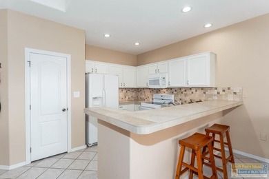 Well-maintained waterfront villa offering furnished, turn-key on South Padre Island Golf Club in Texas - for sale on GolfHomes.com, golf home, golf lot