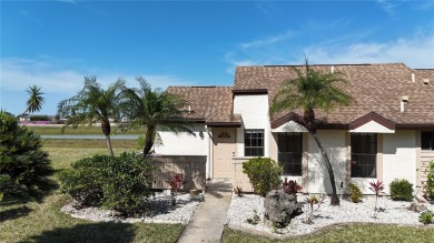 Welcome home to your lovely 2 bedroom, 2 bathroom END UNIT on Sabal Trace Golf and Country Club in Florida - for sale on GolfHomes.com, golf home, golf lot