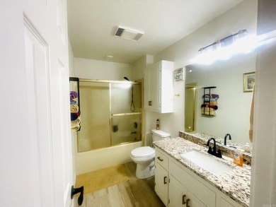 Welcome Home! A charming home tucked away in a beautiful on The Course at River Oaks in Arkansas - for sale on GolfHomes.com, golf home, golf lot